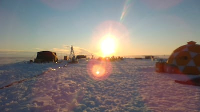The midnight sun shines on the Dotson Ice Shelf in Antarctica. AP