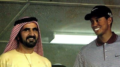 DUBAI, UNITED ARAB EMIRATES - MARCH 7: His Highness Sheikh Mohammed Bin Rashid Al Maktoom, UAE Minster of Defence and Crown Prince of Dubai meets with Tiger Woods of the USA after the 2004 Dubai Desert Classic played on the Majilis Course at the Emirates Golf Club on March 7, 2004 in Dubai, United Arab Emirates. (Photo by Warren Little/Getty Images)
