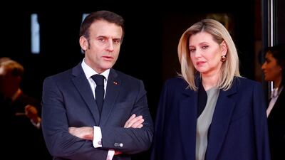 French President Emmanuel Macron with Ukraine's first lady Olena Zelenska at the Paris aid conference on Tuesday. Reuters