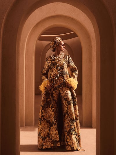 Dolce & Gabbana offers golden rococo brocades and intense floral in this collection. Photo: Dolce & Gabbana