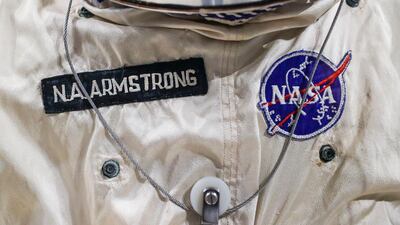 Patches adorn the spacesuit worm by astronaut Neil Armstrong for the Gemini VIII mission.