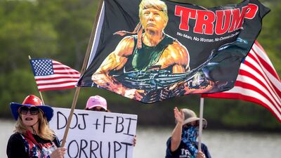 Supporters of former president Donald Trump remain have maintained a vigil outside his Mar-a-Lago residence since the raid. EPA