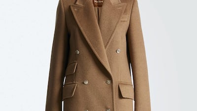 Exclusive to the Middle East: double-breasted coat in camel wool with silk MaxMaragram lining and gold buttons, from Max Mara