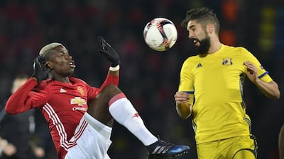 Manchester United’s Paul Pogba fights for the ball with Rostov’s Miha Mevlja during their Europa League round-of-16 football match in Rostov-on-Don on March 9, 2017. Alexander Nemenov / AFP