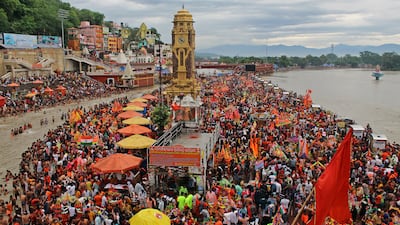 Devotees of Shiva gather to collect holy water from the Ganges during the Kanwar Yatra pilgrimage in July 2023. AFP