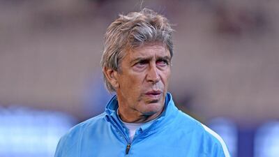 Manchester City manager Manuel Pellegrini watches his team during the pre-season tour match against AS Roma in Australia on Tuesday. Joe Castro / EPA