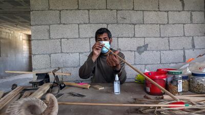 Palestinian man Mohammad Abu Musaed makes bows and arrows for his horseback archery team in the central Gaza Strip. The 40-year-old wants to build a team that can compete internationally. Reuters