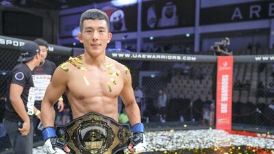 Lee Do-gyeom after beating Rolando Dy to claim the UAE Warriors featherweight title at the Mubadala Arena in Abu Dhabi in October, 2019. Victor Besa/The National