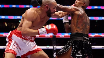 Chris Eubank Jr and Conor Benn in action. Reuters