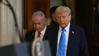 US President Donald Trump and Israel's Prime Minister Benjamin Netanyahu arrive to hold a press conference in the East Room of the White House on Tuesday. AFP