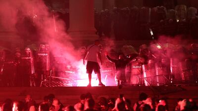 Demonstrators clashed with riot police and set off flares. Reuters