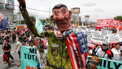 Anti-government protesters display an effigy of president Rodrigo Duterte during a march towards the Philippine Congress ahead of Duterte's State of the Nation address in Quezon city, Metro Manila Philippines. Erik De Castro / Reuters