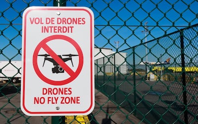 'Drones no fly zone' sign Liege Airport terminal. EPA / OLIVIER HOSLET