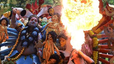 Artists perform during the Bonalu festival at the Sri Akkanna Madanna Mahankali Temple in Hyderabad. Noah Seelam / AFP