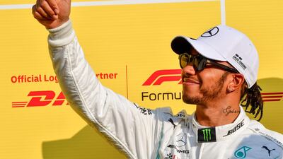 Hamilton gives the thumbs up ahead of the final race. AFP