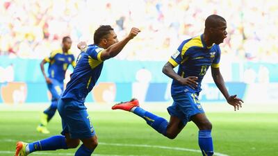 Enner Valencia of Ecuador, right, celebrates scoring his team's first goal with Jefferson Montero during their 2014 World Cup match against Switzerland on Sunday in Brasilia, Brazil. Stu Forster / Getty Images