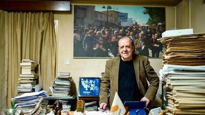 Sener Levent, chief editor of Afrika Gazetesi newspaper, poses for a picture in his office at the paper's headquarters in the northern side of the Cypriot capital Nicosia. AFP