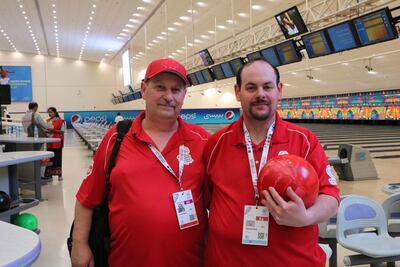 Canadian Charles Muir (right) got into bowling to make friends. Courtesy Special Olympics IX Mena Games 2018