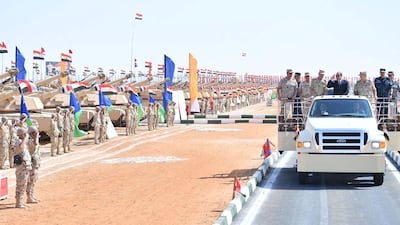 The military inspection was carried out in an open-top car