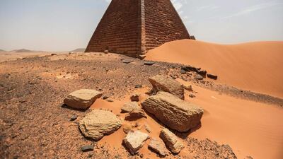 A view of the historic Meroe pyramids in al-Bagrawiya. The steep, small pyramids rise over the desert hills, a stunning reminder of the ancient Nubian kingdom that once ruled Egypt _ and ones not nearly as visited as those of its neighbor.