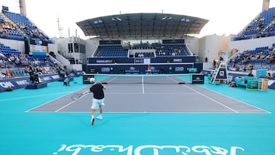 Denis Shapovalov hits a forehand to Taylor Fritz during their Mubadala World Tennis Championship quarter-final. Reuters