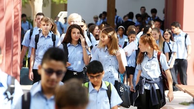 No specific PCR tests are required before returning to school but anyone with symptoms should stay home and isolate. Pawan Singh / The National