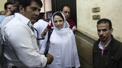 Aya Hijaz, a dual US-Egyptian citizen, is acquitted by an Egyptian court after nearly three years of detention over accusations related to running a foundation dedicated to helping street children, Cairo, Sunday, April 16, 2017. AP Photo/Mohamed El Raai