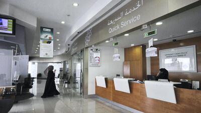 An employee works inside one of Dubai Islamic Bank's women-only branches in Deira. Jumana El-Heloueh / Reuters