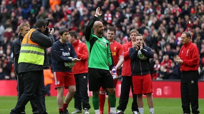 Former Liverpool goalkeeper Pepe Reina waves to the fans. Alex Morton / Reuters