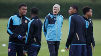 Arsenal manager Arsene Wenger observes his team during their Champions League training session on Tuesday. Paul Childs / Action Images / Reuters