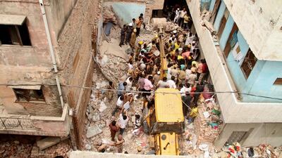 Eleven people died and one survivor was being treated in a hospital, said fire service officer Praveer Haldiar. EPA