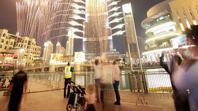 People watch fireworks at the Burj Khalifa. Ali Haider / EPA