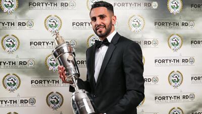 Leicester City's Riyad Mahrez poses with his PFA Player of the year award during the 2016 PFA Awards at the Grosvenor House Hotel, London. PA