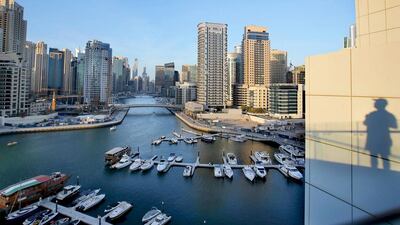 The Marina waterfront in Dubai. The emirate's total real estate transactions in May reached Dh21.8 billion, according to DLD. Kamran Jebreili / AP Photo