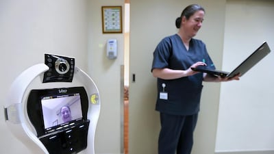Arlene Susanne Ryan, quality coordinator explains about the VGo Robotic Telepresence at Amana Healthcare in Al Ain. Pawan Singh / The National