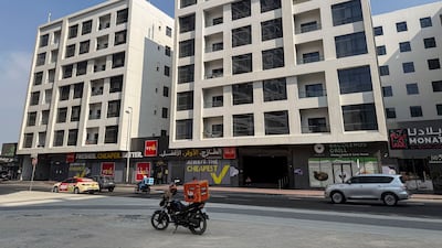 The building has a swimming pool on the roof