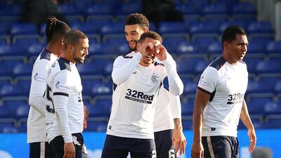 James Tavernier (centre) celebrates after scoring their sides second goal during the Ladbrokes Scottish Premiership match between Ross County and Rangers at Global Energy Stadium on December 06, 2020 in Dingwall, Scotland. Getty Images