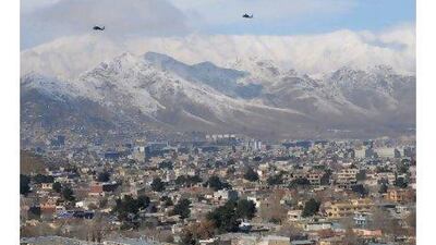 US helicopters fly over the Afghan capital Kabul. A reader supports a proposal by a former US ambassador to India to partition Afghanistan along tribal lines. Shan Marai / AFP