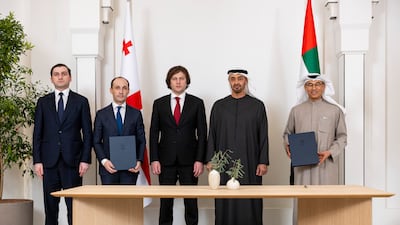 Members of the Georgian delegation with President Sheikh Mohamed and Mohamed Al Abbar. Ryan Carter/UAE Presidential Court