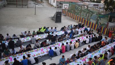 Refugees from Moria camp break their fast at One Happy Family Claire Corkery / The National