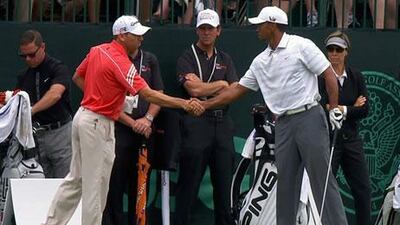 Sergio Garcia, left, and Tiger Woods shook hands during practice for the US Open. AP Photo
