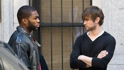 Curtis '50 Cent' Jackson, left, and Chase Crawford on the set of Twelve. As well as acting, the rapper's involvement in film extends to directing and production.