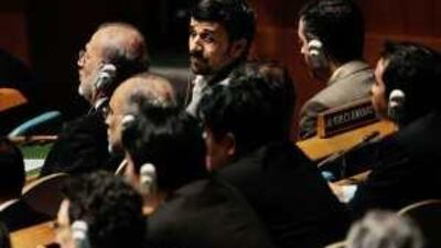 Mahmoud Ahmadinejad prepares to speak at yesterday's conference.
