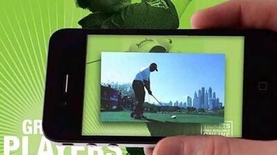 Screen grab of a smart phone pointing at an ad (ad ran in The National)