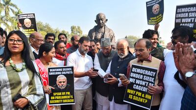 Prominent Congress party members join other opposition politicians in protest over the suspension of MPs from parliament. AP