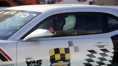 WWE wrestler Sami Zayn shown during a driving exhibition at Yas Marina Circuit on Wednesday in Abu Dhabi. Christopher Pike / The National