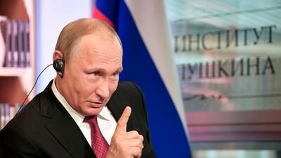 Russian president Vladimir Putin tells reporters in Paris that Russian hackers might “wake up, read about something going on in interstate relations and, if they have patriotic leanings, they may try to add their contribution to the fight against those who speak badly about Russia" / Sputnik, Kremlin pool photo via AP)