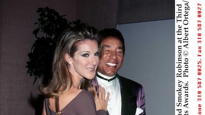 Celine Dion, in a mauve maxi dress, with Smokey Robinson at the Third Annual International Achievement In Arts Awards on September 28, 1997. Getty Images