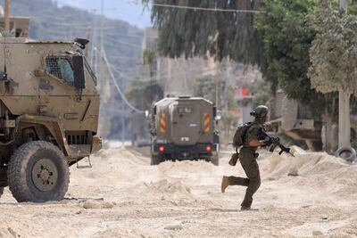 An Israeli soldier during a raid in the Nur Shams camp for Palestinian refugees near the city of Tulkarem in the occupied West Bank. AFP