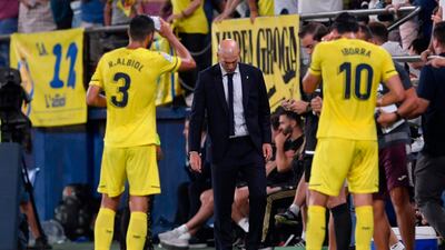 Real Madrid's French coach Zinedine Zidane (C) reacts during the Spanish league football match Villarreal CF against Real Madrid CF at La Ceramica stadium in Vila-real. AFP